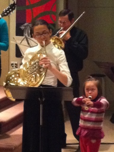 My youngest daughter playing alongside my oldest at the Christmas Eve service.